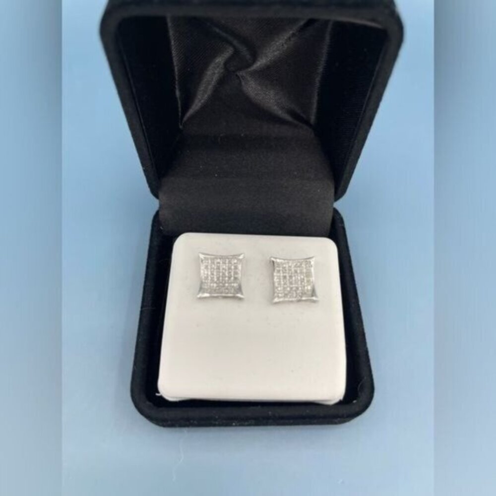14k white golf 1/4 TCW diamond earrings